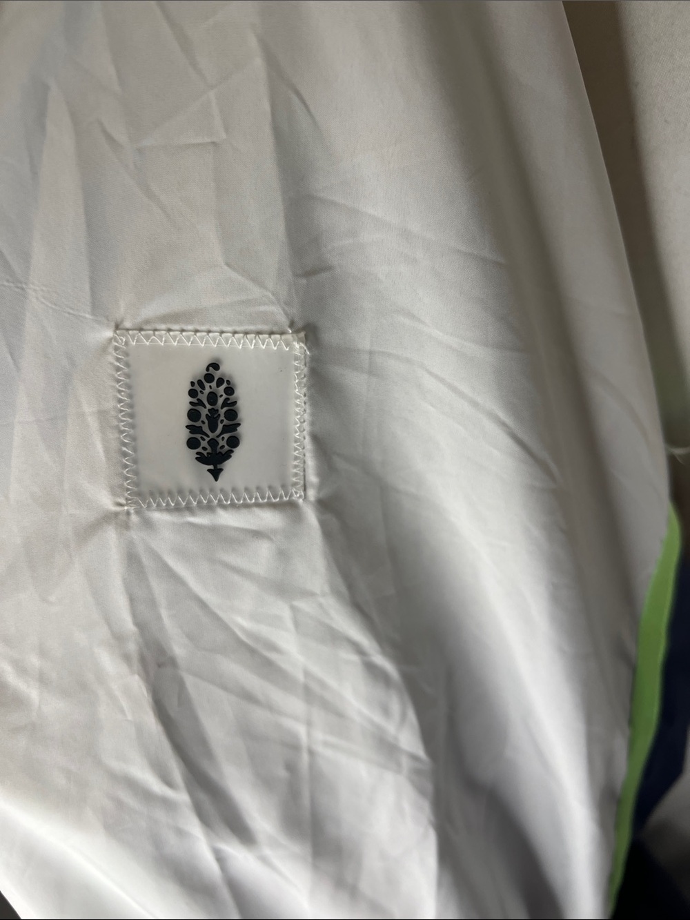 FP Movement Cares By The Wind block Logo in Navy and Lime Green Jacket. - Picture 6 of 13